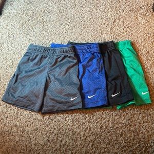 4 Pairs of Solid Color Boys Nike shorts